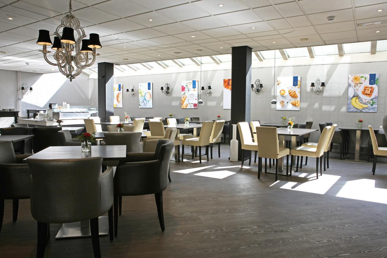 Hotel De Lis Lisse Esterno foto